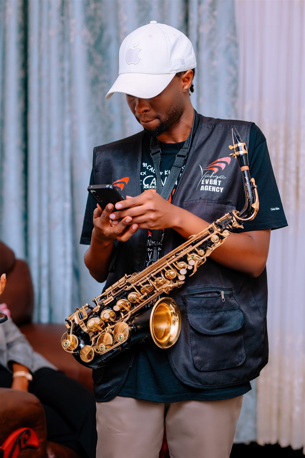 A Yahya Event Agency saxophonist preparing for a live performance